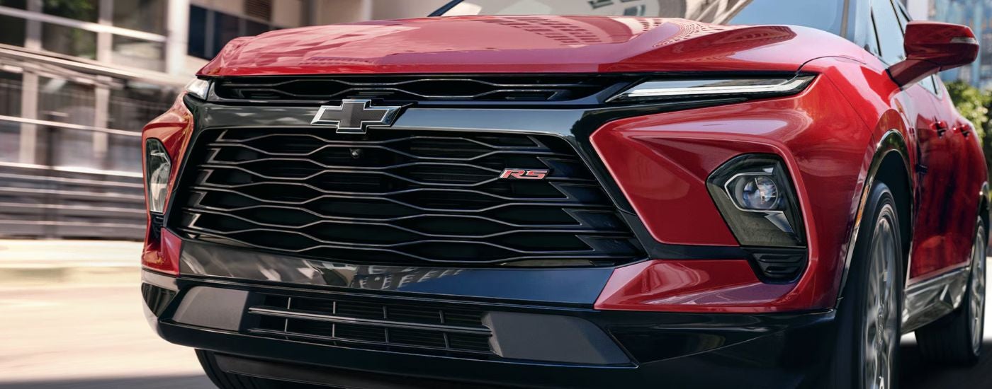 Front grille of a red 2026 Chevy Blazer RS.