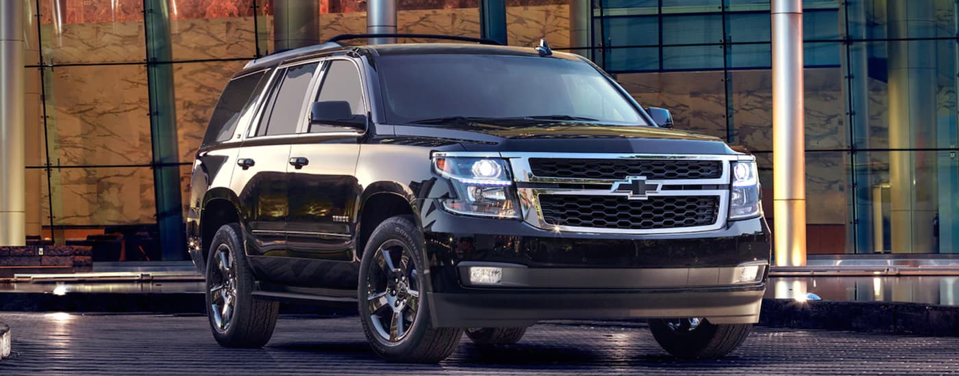 Black 2017 Chevy Tahoe Midnight Edition parked at an angle
