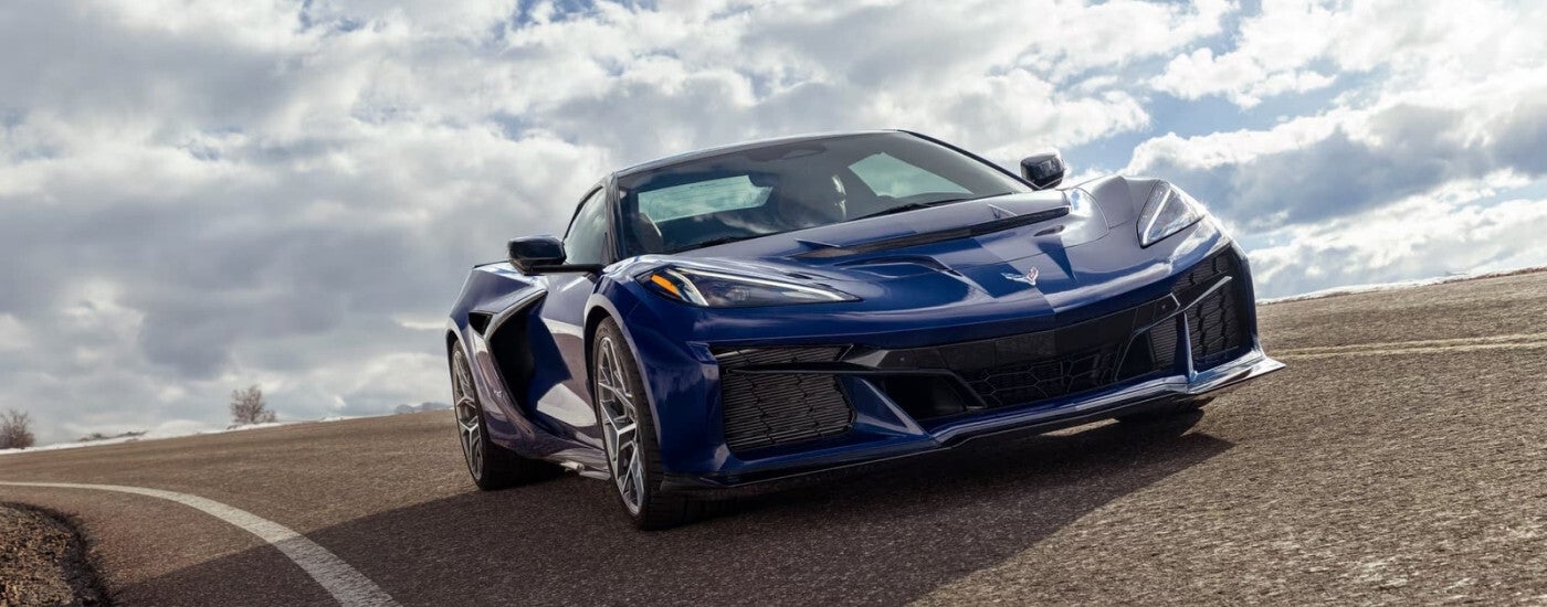 Blue 2025 Chevy Corvette ZR1 driving around a track